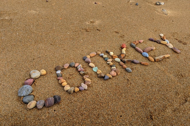 I will create a wonderful photo using stones in the beach with your message